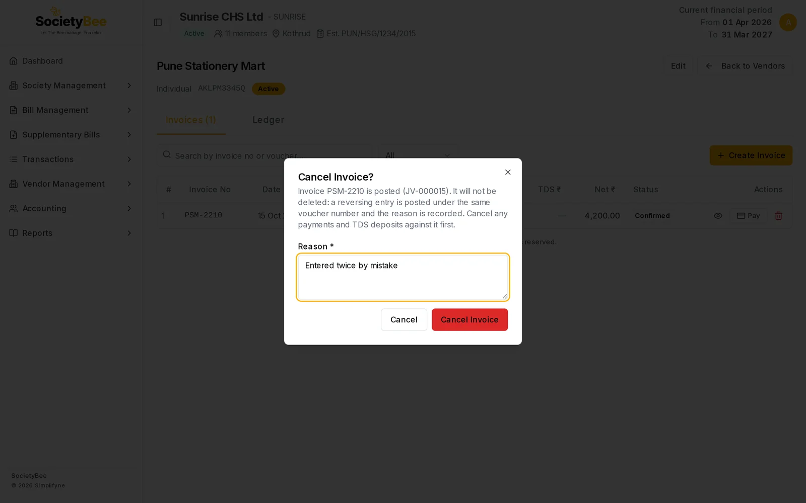 Cancel Invoice box saying PSM-2210 is posted and a reversing entry will be posted, with a Reason box filled in and a red Cancel Invoice button
